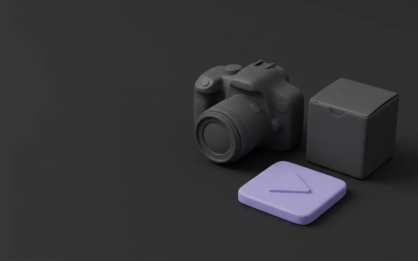 Fotoaparát, krabička produktu a fialové tlačítko přehrát z měkkého materiálu